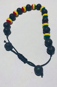 a bracelet with red, yellow and green beads